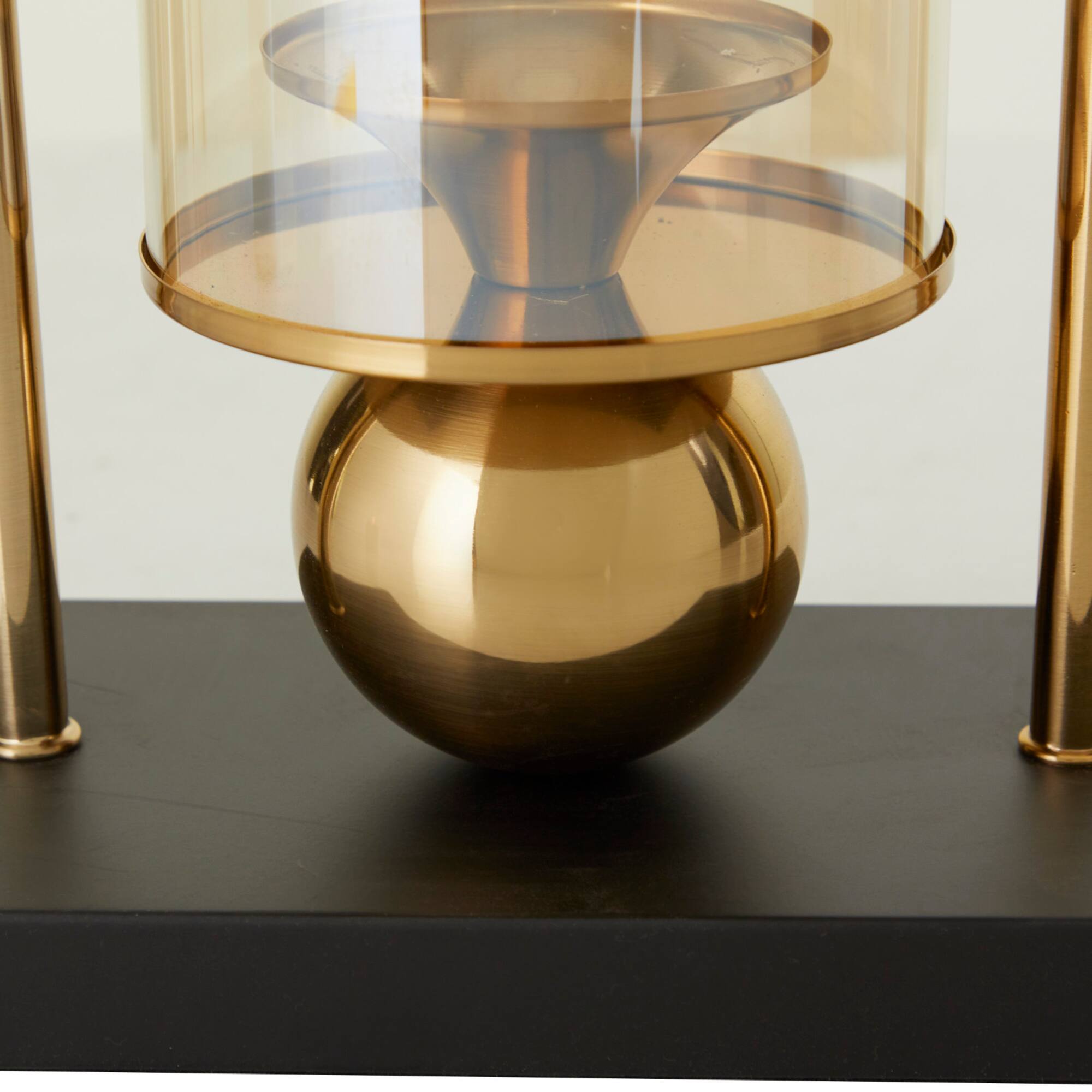 CosmoLiving by Cosmopolitan 17" Gold Metal Pillar Hurricane Lamp with Metal Stand